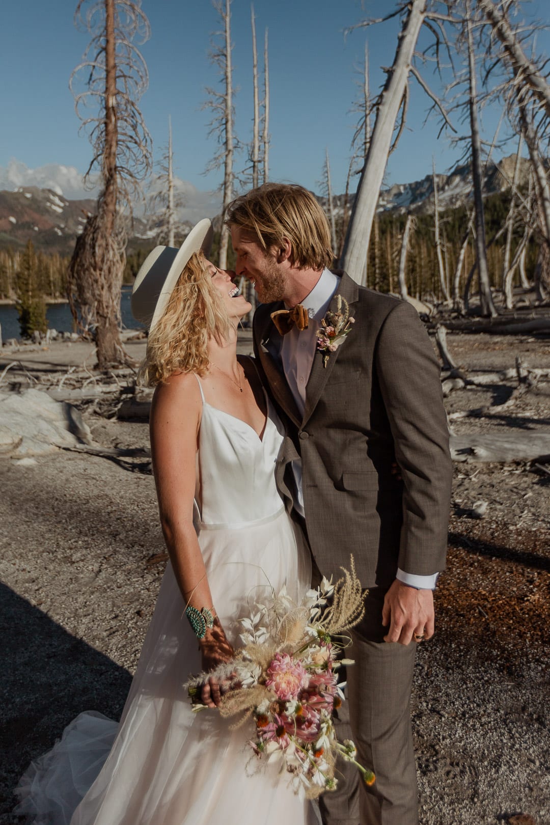 Tyler and Haylee kiss after saying their vows at Mammoth Lakes