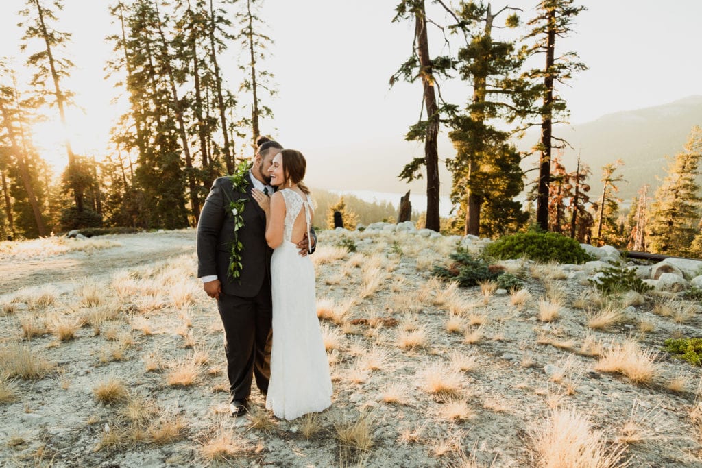 Alonzo and Bethany snuggle close after saying their vows at their mountain top elopement. 