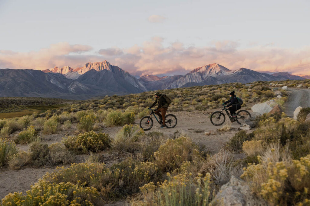 A couple mountain bikes on their wedding day to some hot springs in Mammoth Lakes, CA. 
